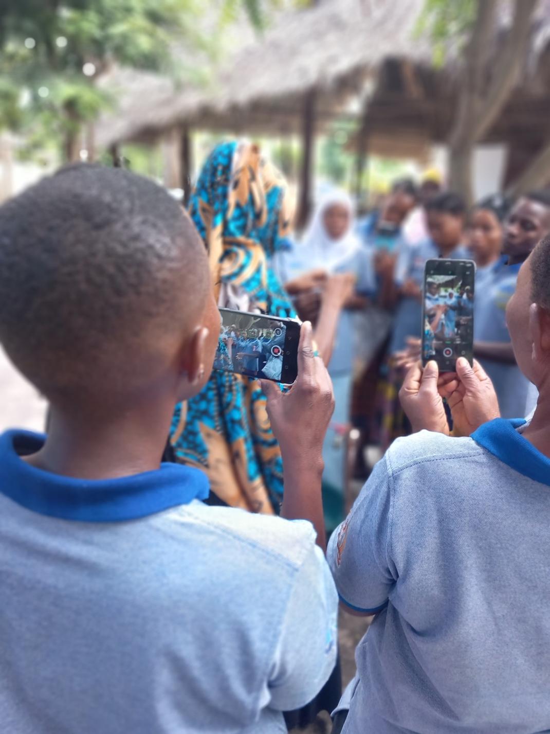Young people learning about water quality. (c) Women Water Watch